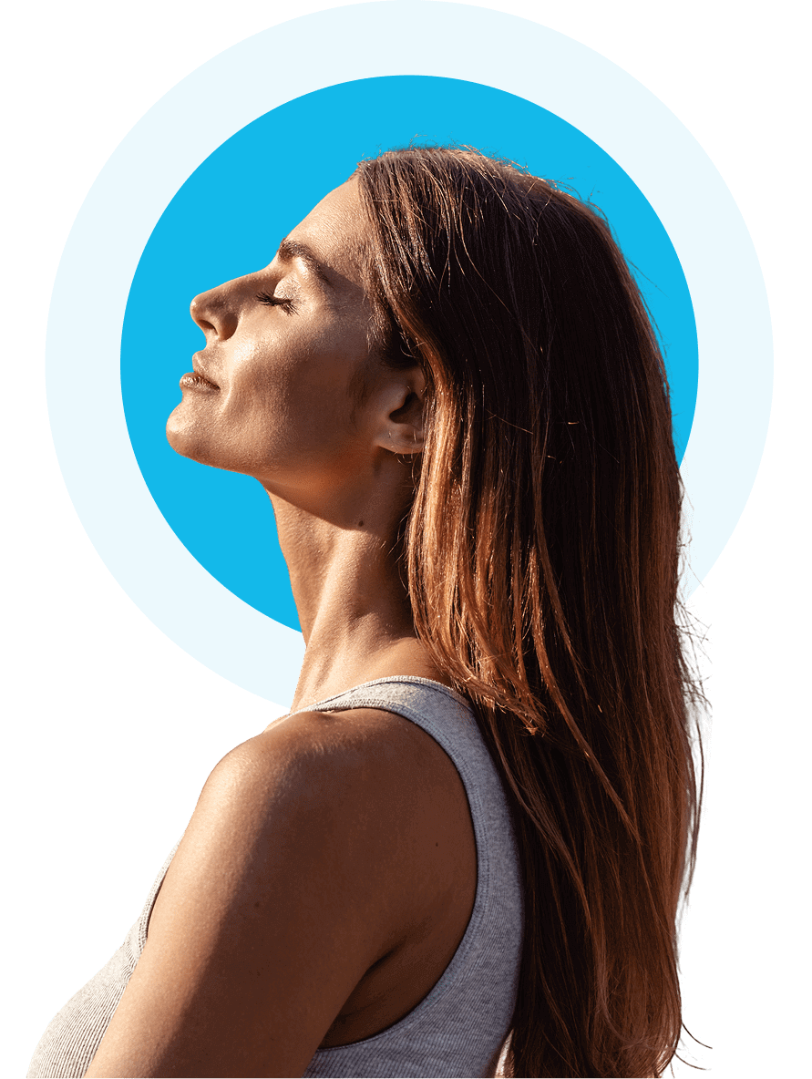 Sunlit side profile of woman with halo