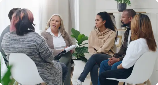 Group therapy session with diverse participants